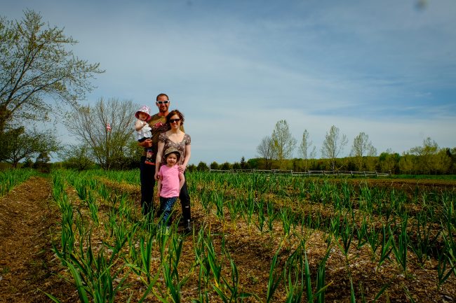 kgf-photo The Kitchen Garden Farm is the brainchild of Greg Simms, pictured here with his family.